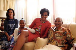Michelle Obama and her daughters visit Nelson Mandela