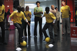 Michelle Obama observes kids joggling the ball