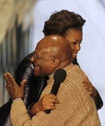 Michelle Obama embraces Archbishop Desmond Tutu
