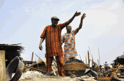 aggrieved old man and his son by aderemiadegbite.gif