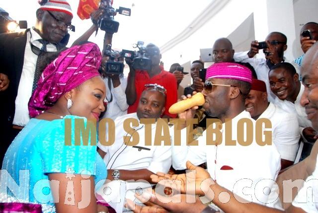Hon.Uche Nwosu gulping down the wine from his wife.