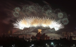 Sydney's balmy summer night was lit up by 7 tons of fireworks which were fired from roof tops a