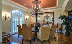 Dining Space - The dining room which features a wrought-iron chandelier.jpg