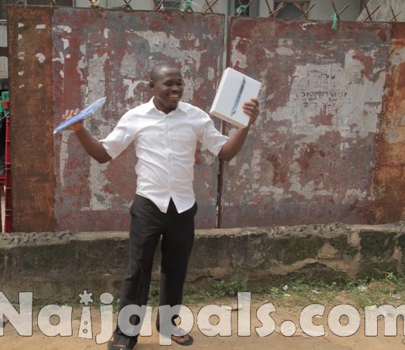 Excited Nebo Afam displays his iPad