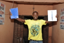 Oluwole Abiodun displays his iPad.JPG