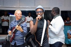 0002-Festival-News-Nigerian-Idol-winner-Moses-aka-the-Teddy-Bear-ushered-to-the-stage-by-BEZ.jpg