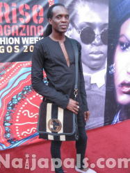 ANDY OGBECHE, model instructor and choreographer in black outfit