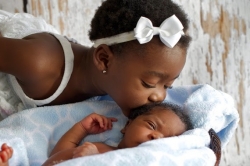 10. Mercy Johnson's daughter Purity and son, Prince Henry.jpg